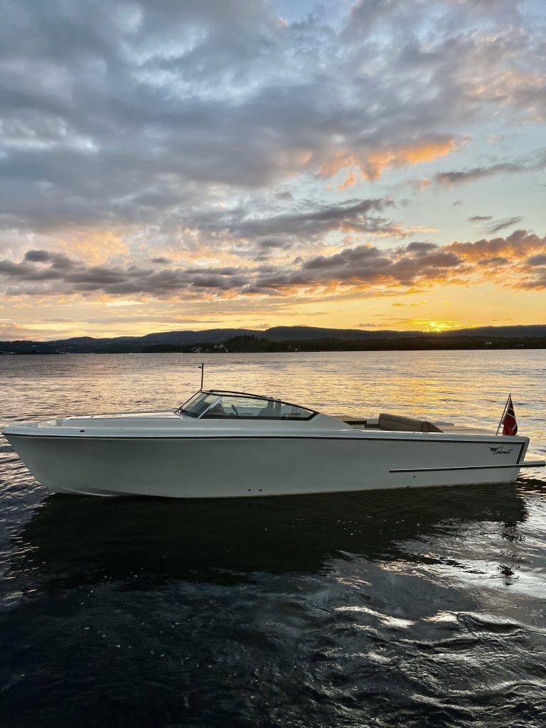 Coronet boat in sunset
